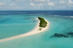 Mathiveri Long Picnic Island with scenic views, clear waters, and lush greenery.
