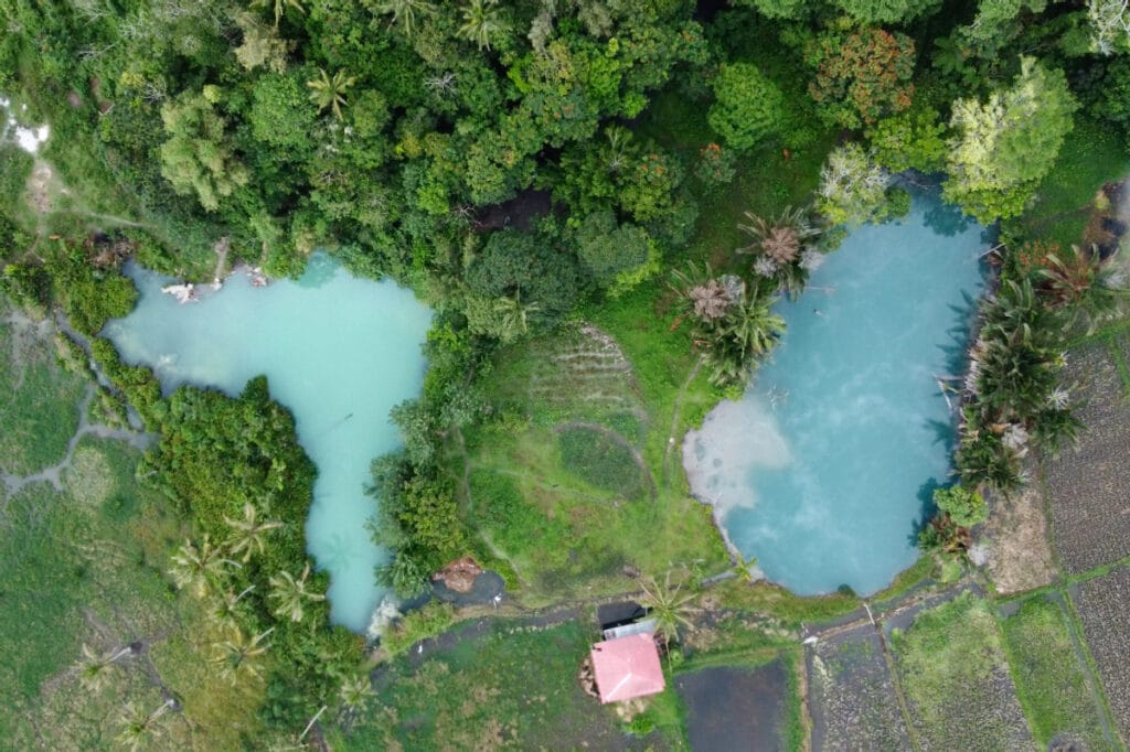 90° drone view of Ranolewo Hot Springs from above in Sulawesi